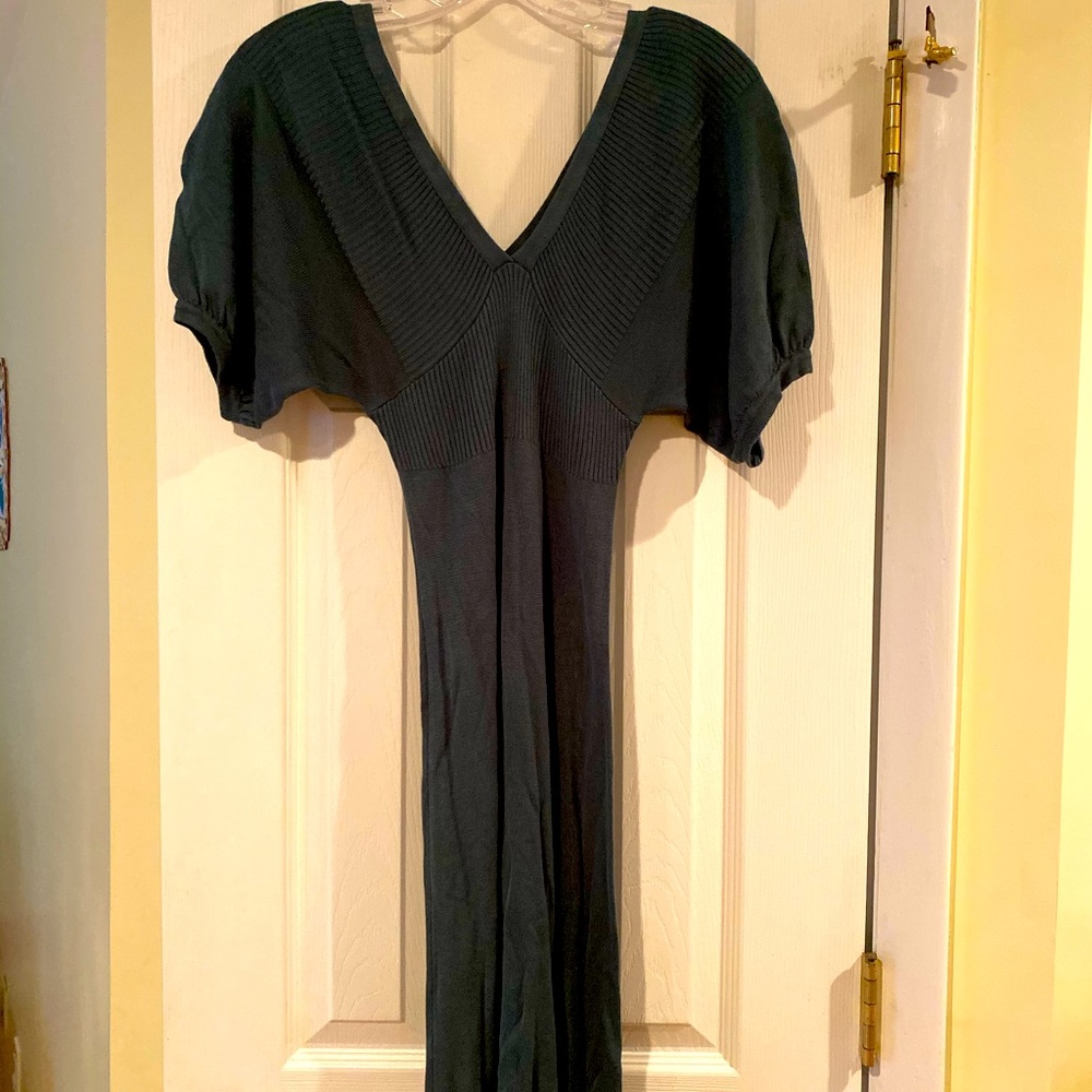 Flattering form fitting Green knit dress
